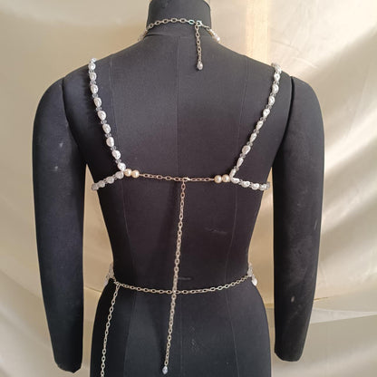 Adjustable tie back and neck closure of pearl bralette necklace ensuring flexible and comfortable fit