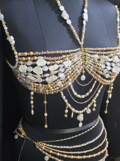 Delicate beaded bralette on a black mannequin